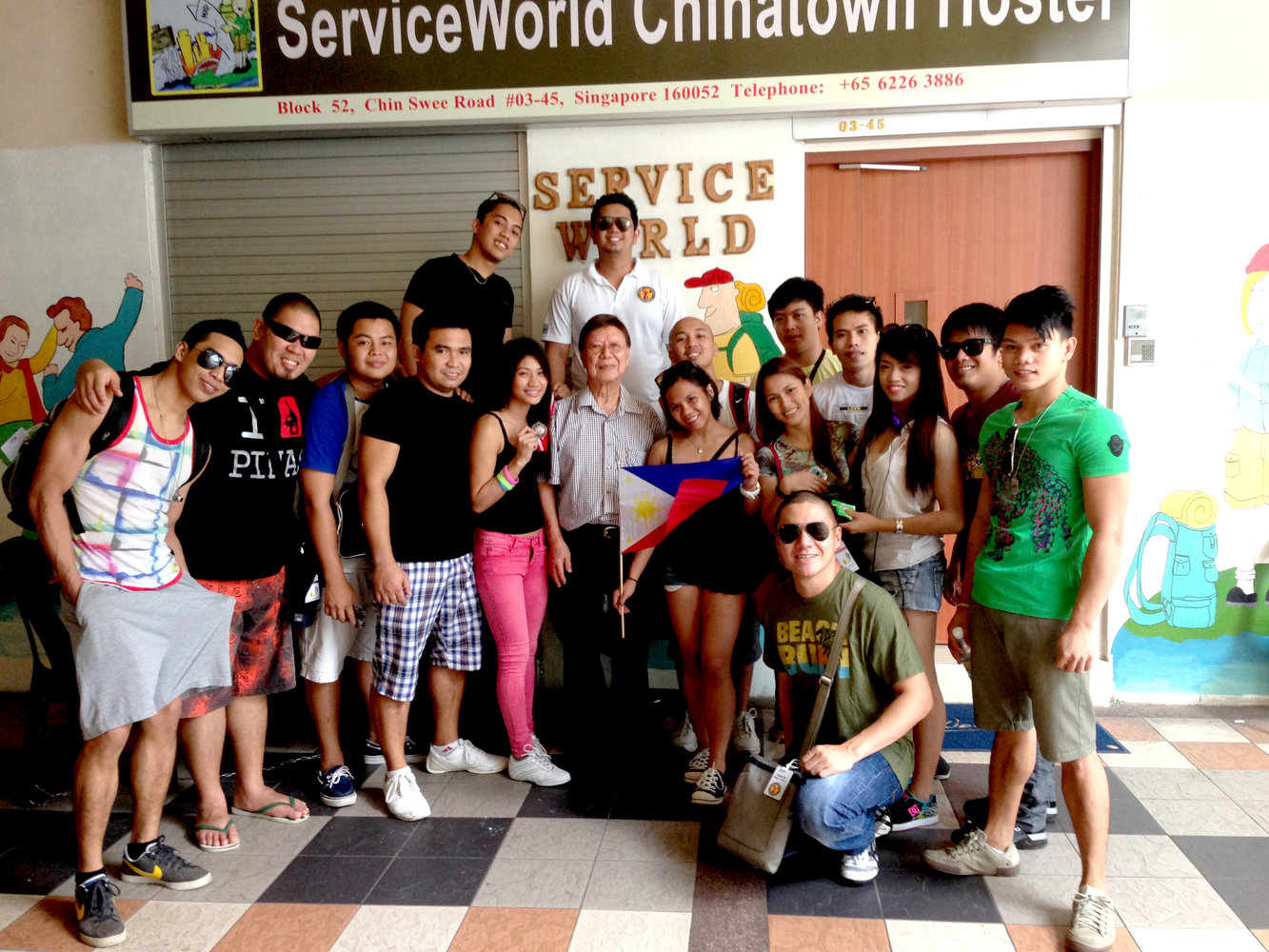 A group of guests at the entrance of the Hostel Restaurant