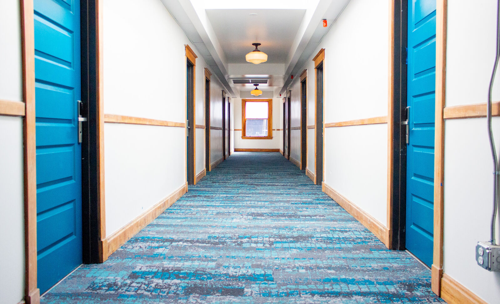 Historic hallways at 11th Avenue Hostel.